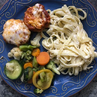 fettuccini alfredo with chicken parmesan mini meatloaves, one of the cold weather make ahead meals