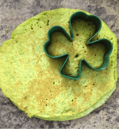 cutting St. Patrick's Day pancakes