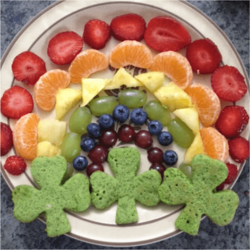 St. Patrick's Day pancakes with a fruit rainbow